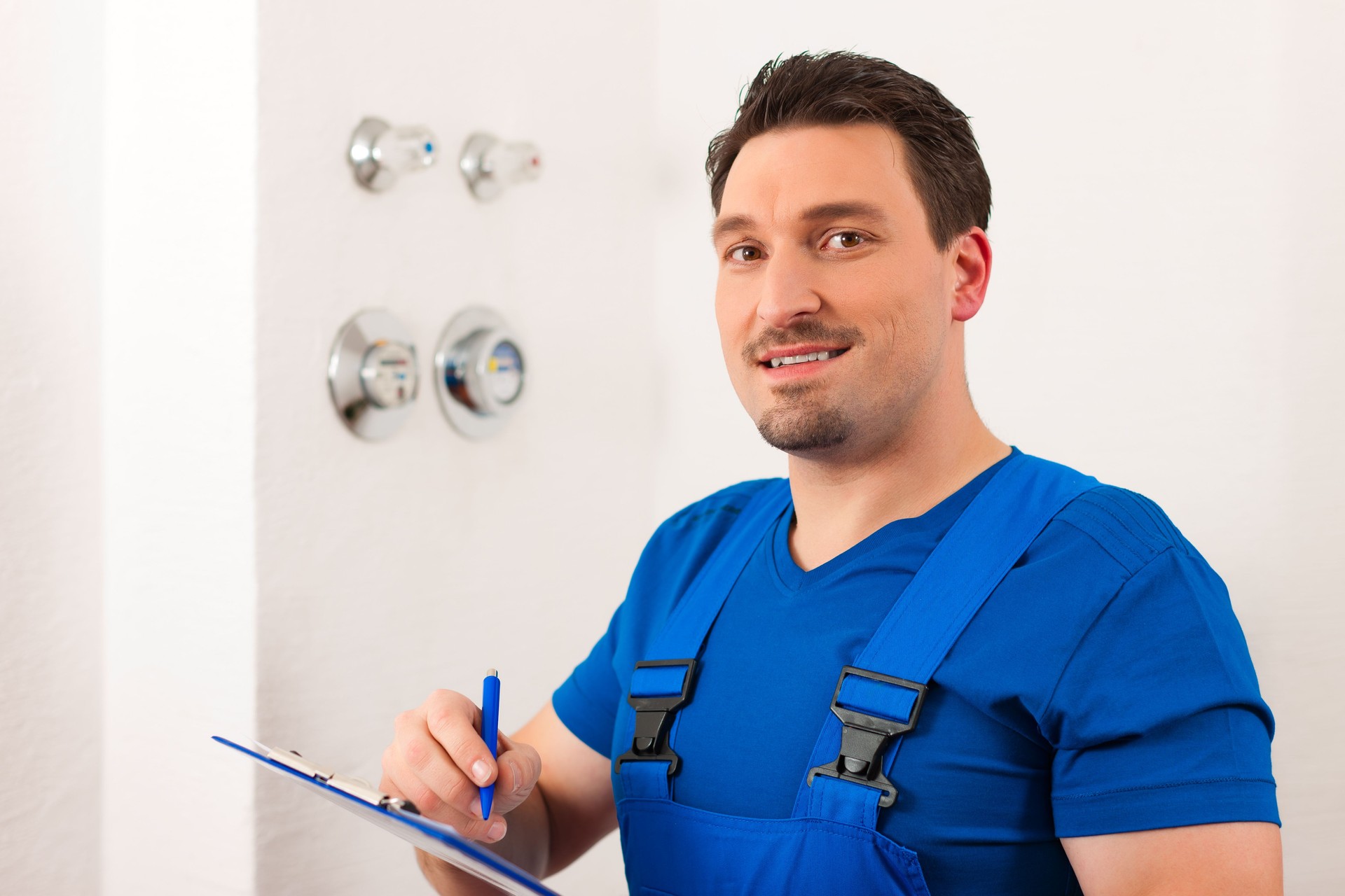 Technician reading the water meter